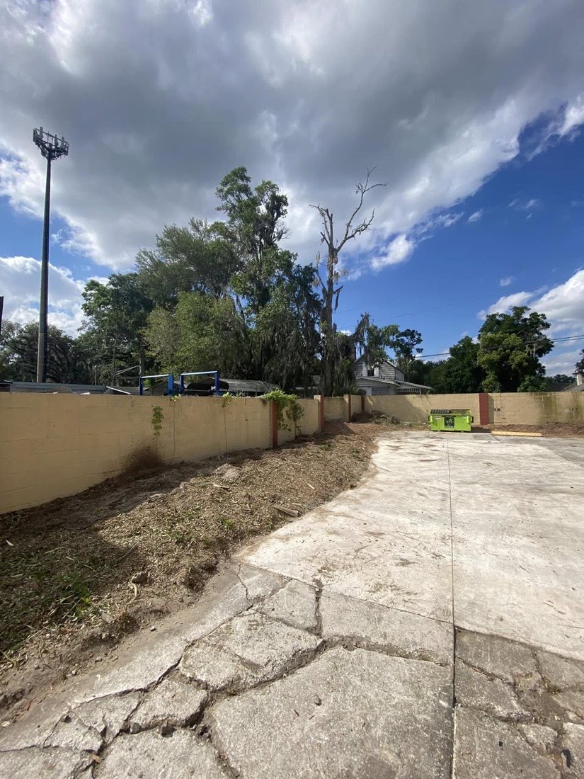 After: lot cleared and swept clean